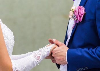 wedding theme, bride and groom holding  hands