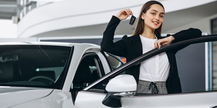 woman choosing car car showroom
